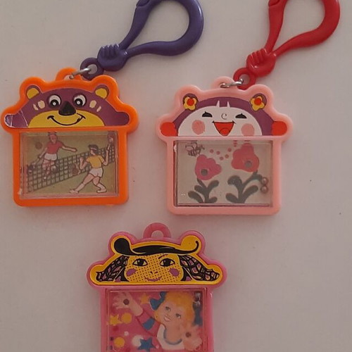 Vintage '80s games keychains with marbles like new