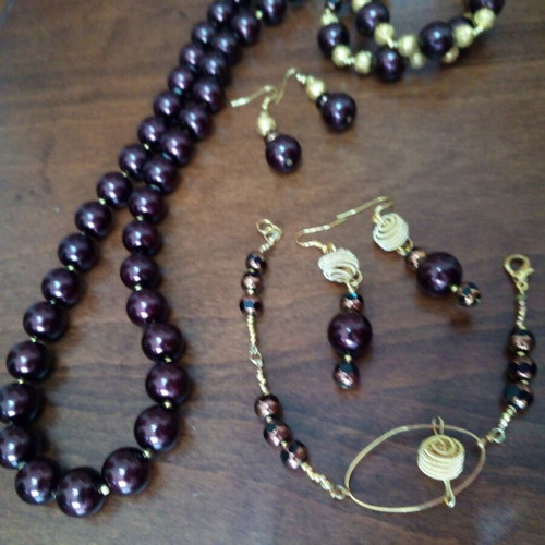 Set of handmade jewelry with burgundy glass pearls like new