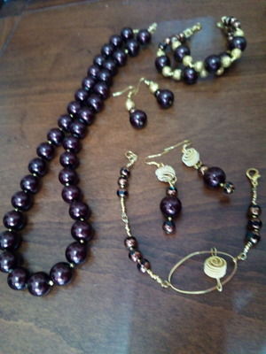 Set of handmade jewelry with burgundy glass pearls like new