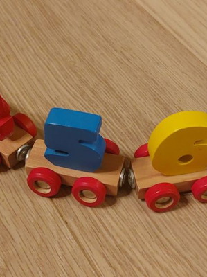 Educational wooden train with numbers like new