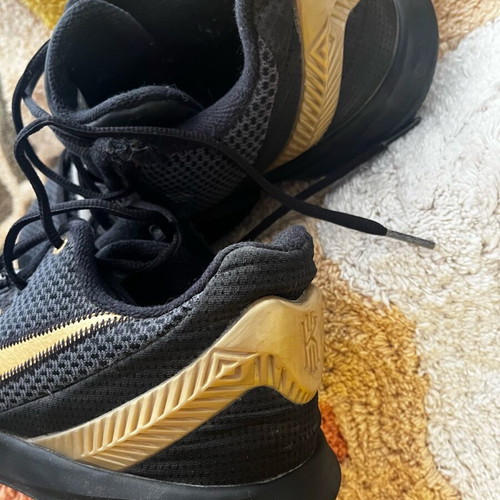 Nike athletic shoes size 42.5 used, black and gold