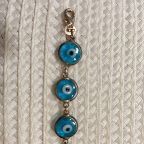 Silver 925 bracelet with blue evil eyes like new