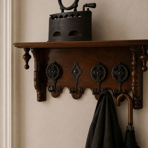 Traditional walnut wood coat rack with 8 brass hooks, like new