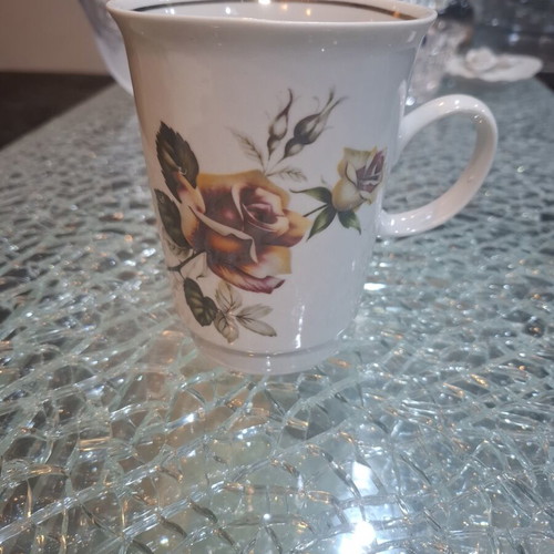 Vintage porcelain mug with rose pattern like new, 1985