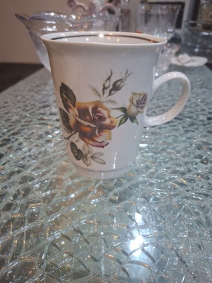 Vintage porcelain mug with rose pattern like new, 1985