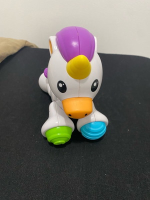 Fisher Price unicorn horse used with sounds and textures
