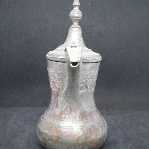Antique copper coffee kanati used with engraved oriental designs