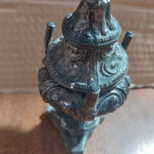 Bronze oil lamp used, 20 cm height