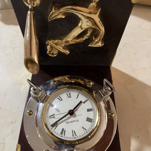 Decorative nautical-themed quartz table clock like new