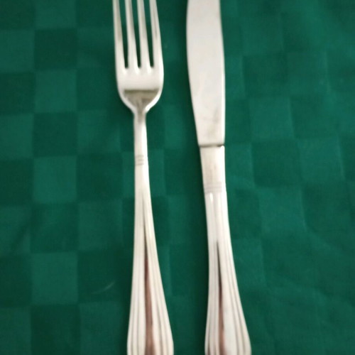 Stainless steel cutlery like new, set of 14 pieces