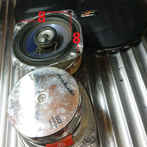 Pair of 4Ω 80W car speakers used with covers