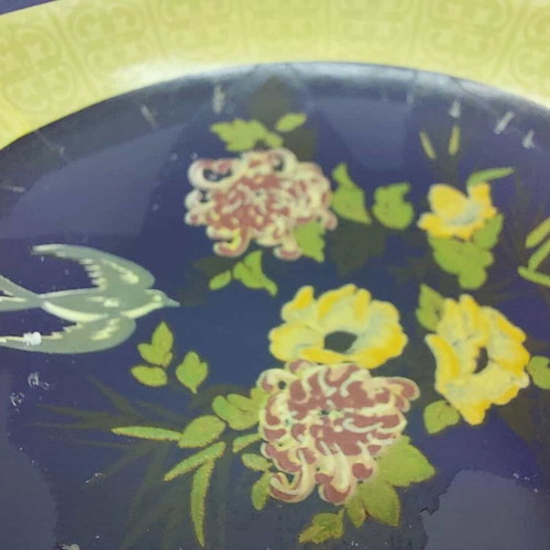 Porcelain ashtray used, blue shade with flowers and yellow details