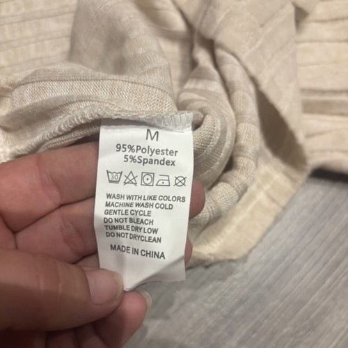 Women's beige turtleneck sweater, size M