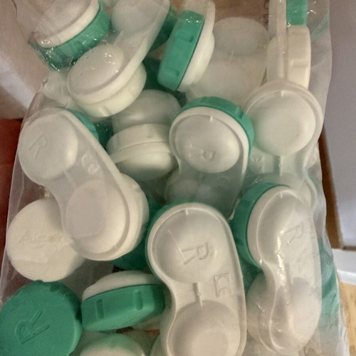 Contact lens cases like new, pack of over 25, white and green