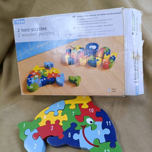Wooden puzzle used, the dolphin, for ages 3 and up