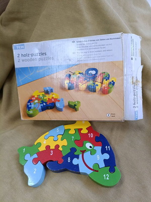 Wooden puzzle used, the dolphin, for ages 3 and up