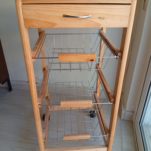 Classic wooden kitchen trolley with ceramic tile top