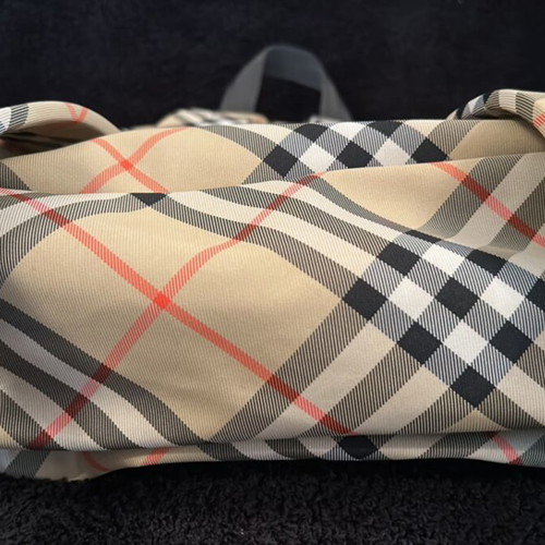 Burberry backpack like new with 2 zippered compartments and adjustable straps