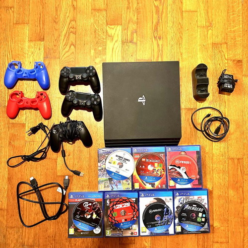 PlayStation 4 Pro 1TB like new with 3 controllers and 7 games