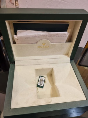 Rolex box used with purchase receipt and accessories
