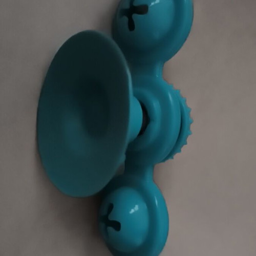 Cat toy with suction cup and treat dispenser