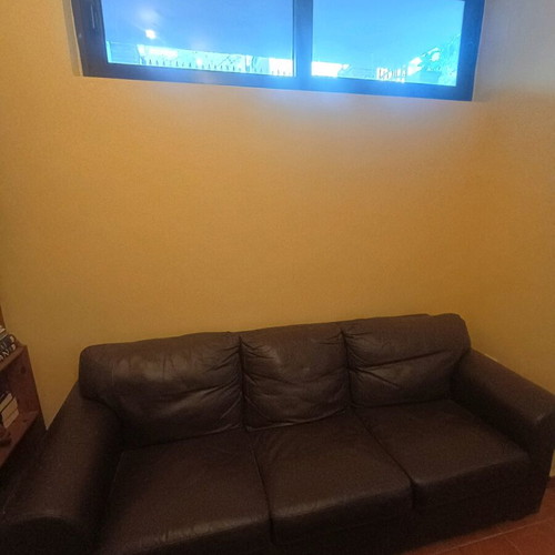 Three-seater leather sofa used