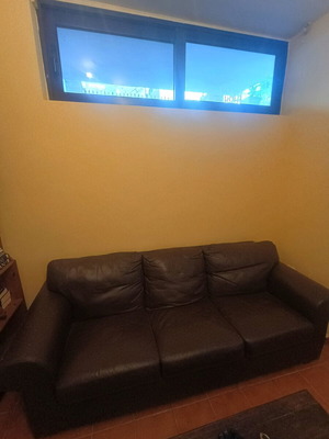 Three-seater leather sofa used