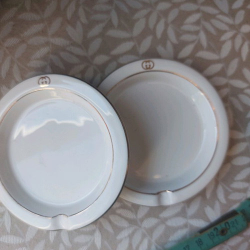 Gucci vintage ashtrays like new, collectible, round with gold decoration
