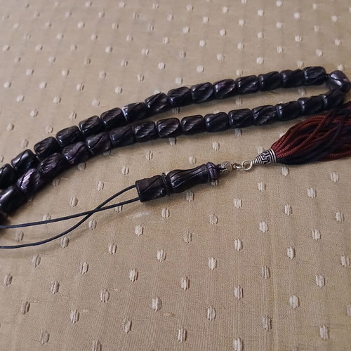 Komboloi bone engraved worry beads used with metal elements and tassel