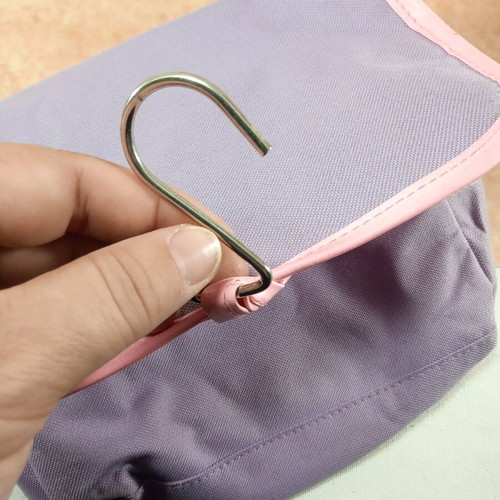 Toiletry bag like new with metal hook, pink and purple