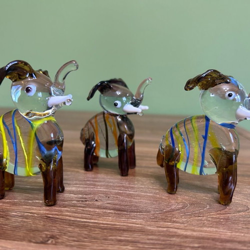 Set of three Murano style decorative glass elephants like new