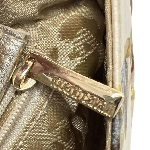 Roberto Cavalli silk clutch used with signs of wear and discoloration