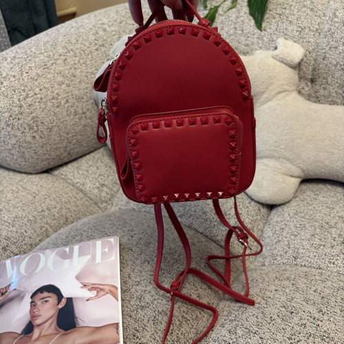 Backpack made of natural leather like new, small red
