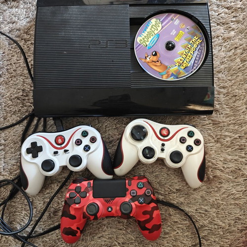 PlayStation 3 used with 3 controllers and 8 popular games