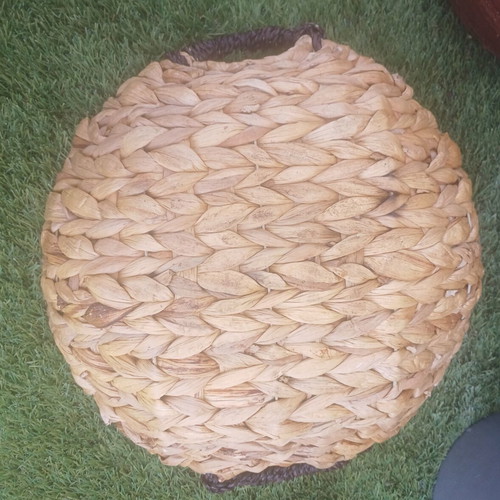 Wicker basket with black handles used