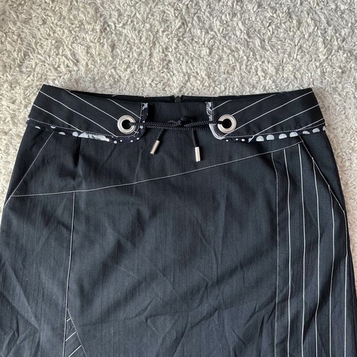 Midi asymmetrical black skirt used, with pocket, size 38