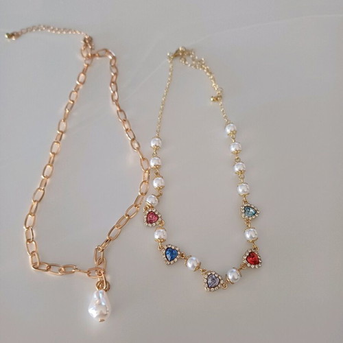 Faux bizou 2 pieces new unused