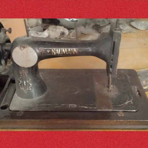 Naumann Hand Sewing Machine used on wooden antique base