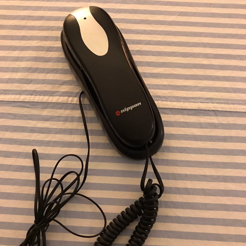 Home phone device used, black wired