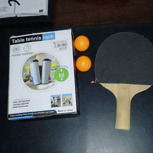 Ping Pong set used with adjustable net, paddle and 2 plastic balls