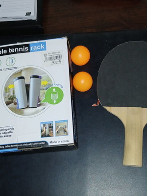 Ping Pong set used with adjustable net, paddle and 2 plastic balls