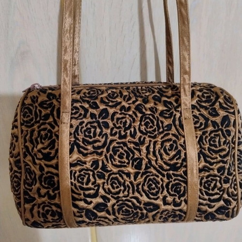 Satin handbag new, black with gold embossed patterns