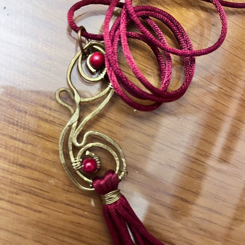 Handmade long necklace with silk cord new, red and gold