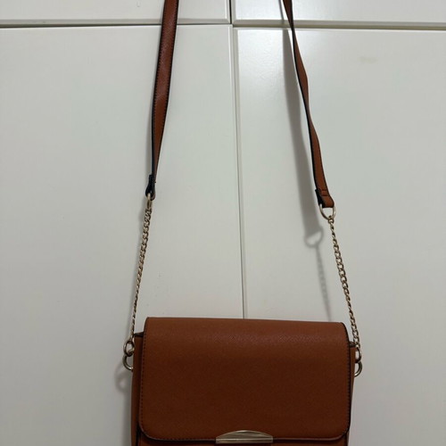 Small tan crossbody bag lightly used