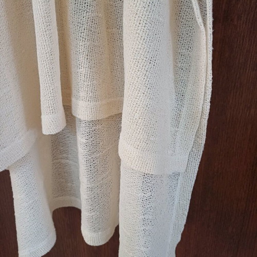 Summer blouse used, semi-transparent long with longer back