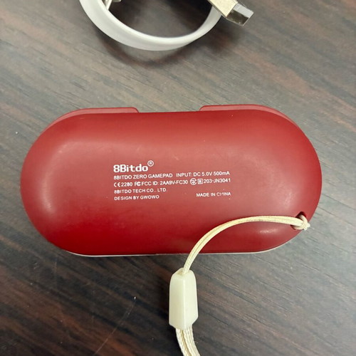 8BitDo Zero gamepad used with USB cable