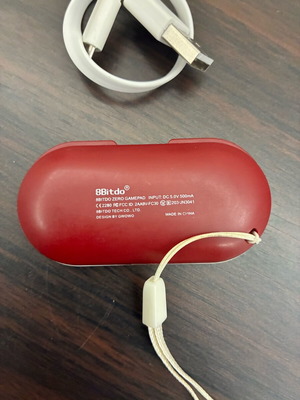 8BitDo Zero gamepad used with USB cable