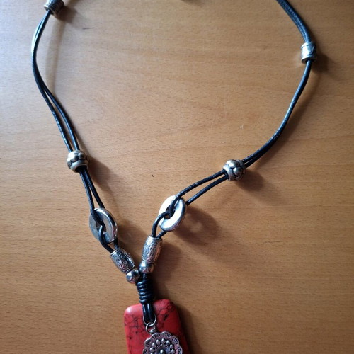 Women's necklace with red stone pendant and silver accessories like new