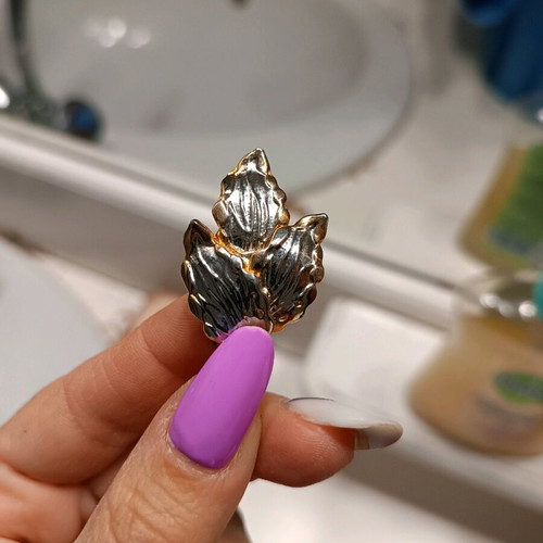 Silver and gold leaf-shaped earrings like new