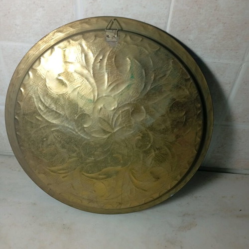 Brass carved tray like new with embossed patterns